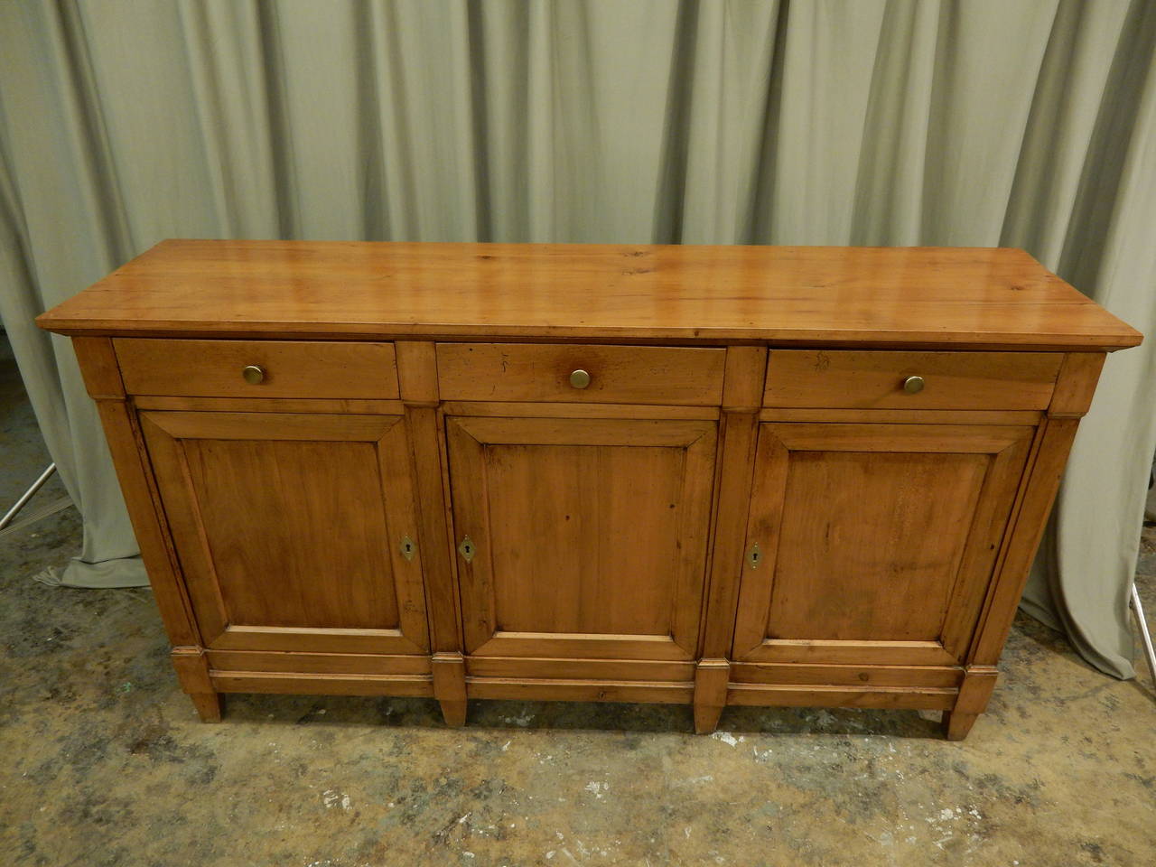 Very nice 19th century French Directoire style fruitwood three-drawer and three-door enfilade.