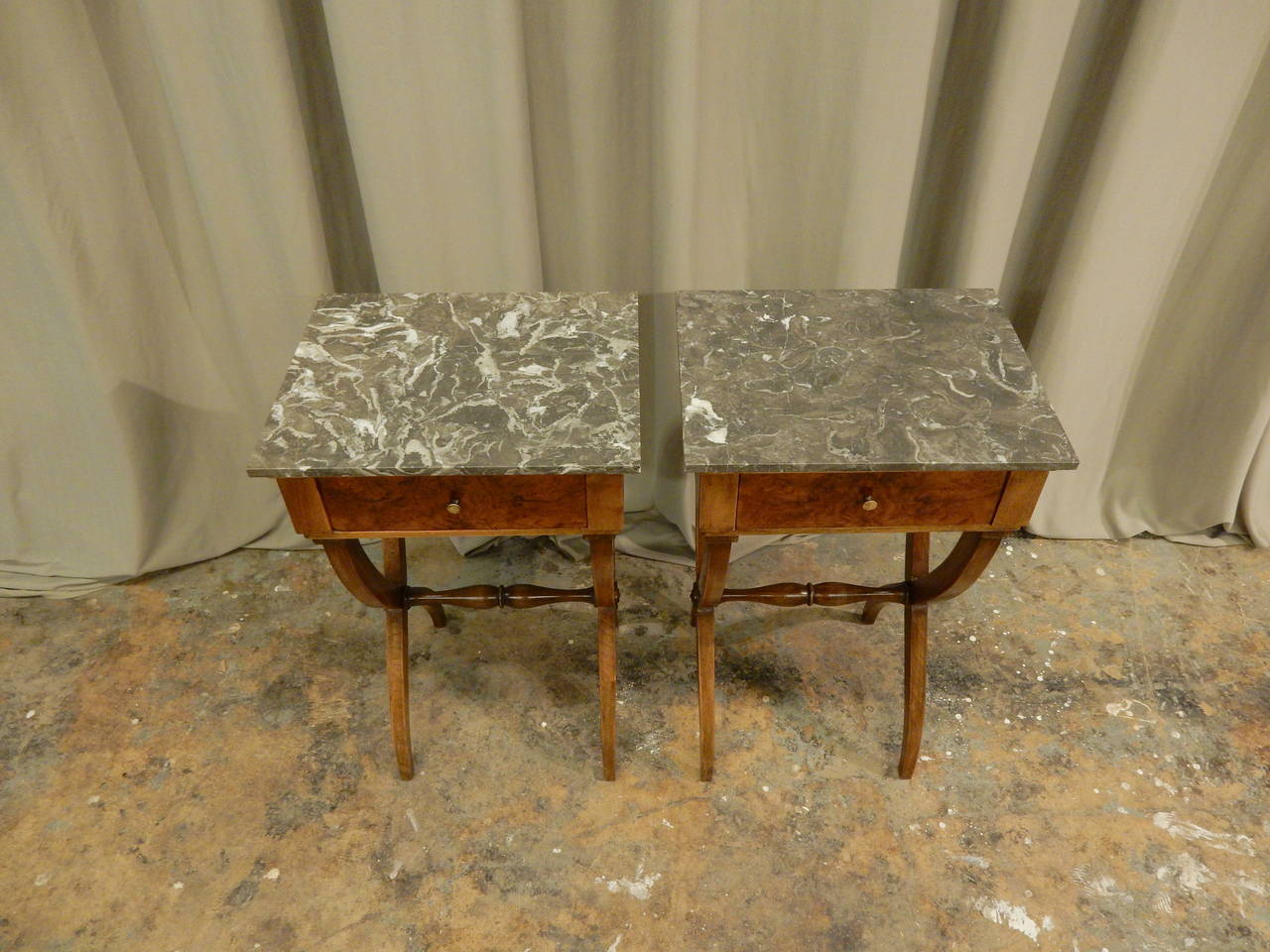 Pair of mid-19th century French walnut side tables with one draw and marble top.
carefully restored.