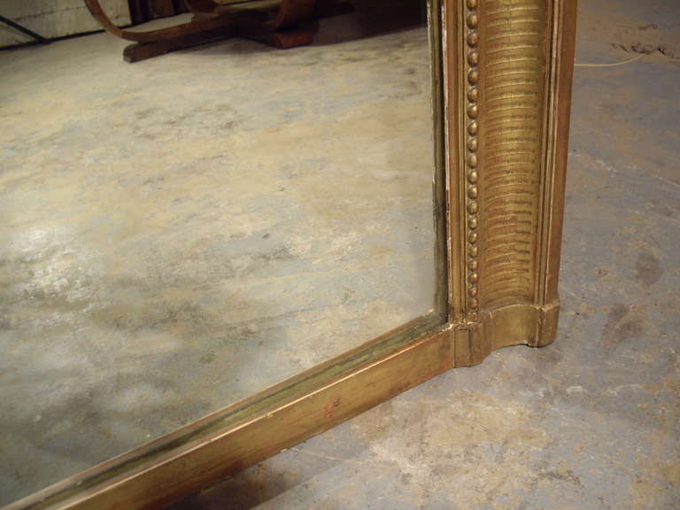 19th Century 19th century French Restauration gold gilt mirror For Sale