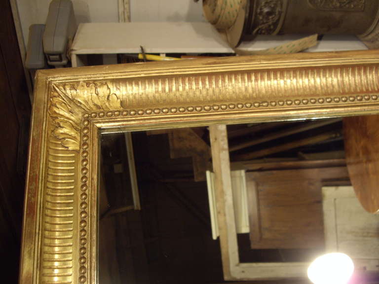 Giltwood 19th century French Restauration gold gilt mirror For Sale