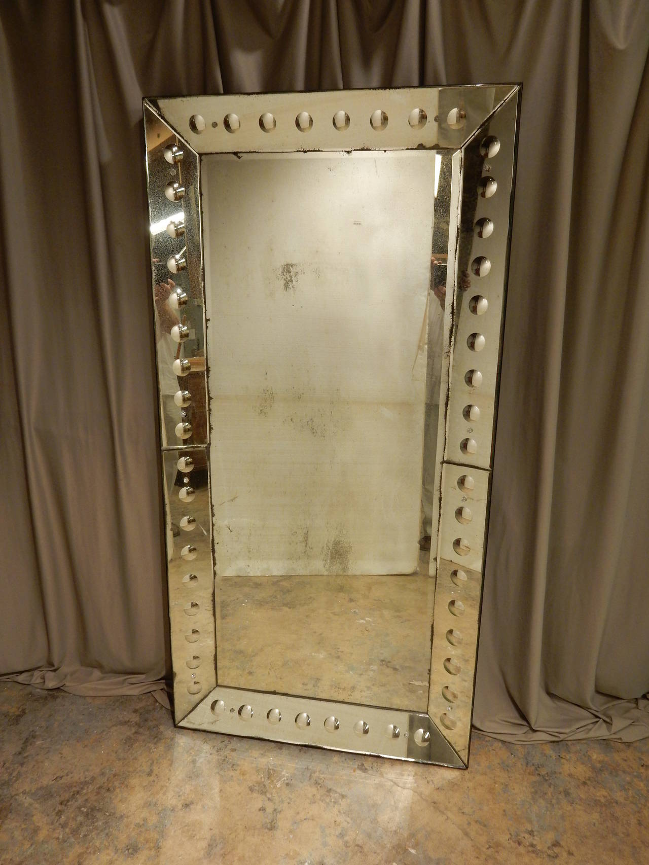 1940s French mirror. Original glass. New black felt on back and sides of mirror.
