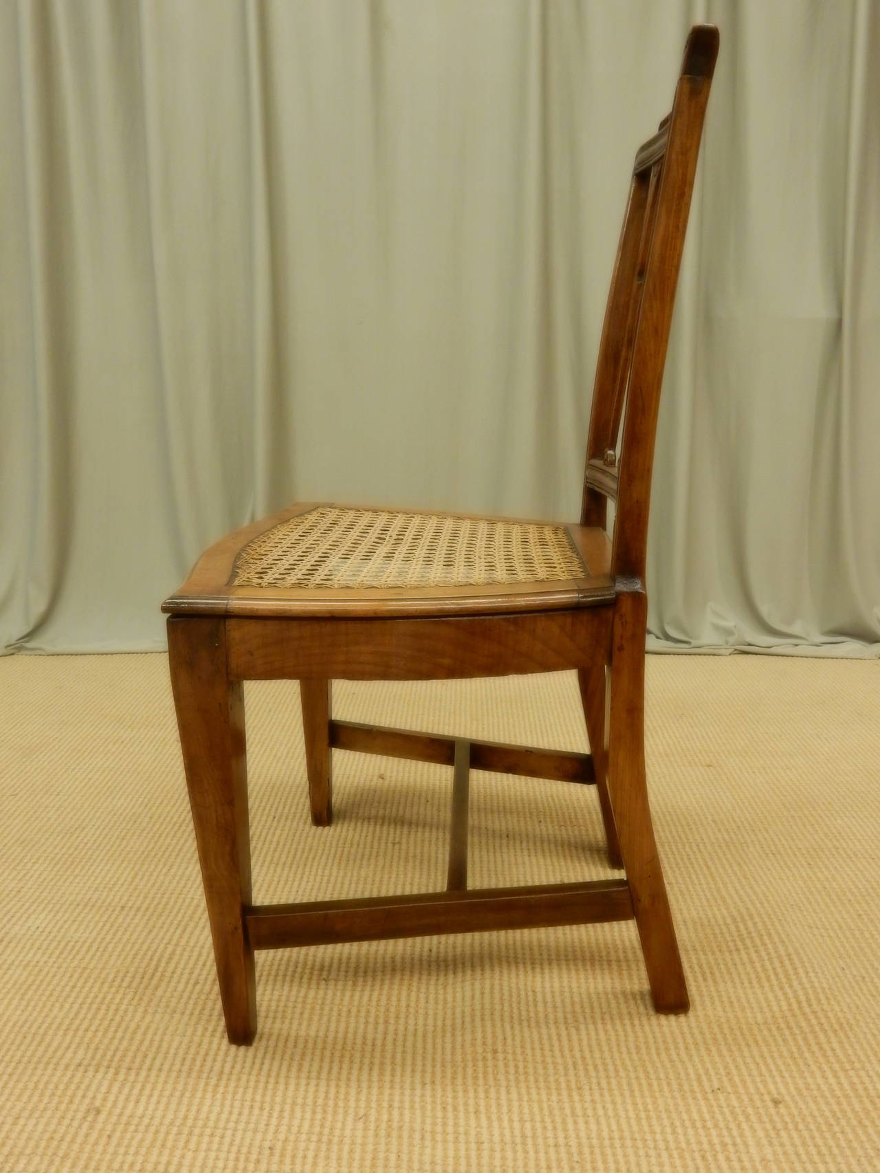 8 Italian 19th. c walnut canned seat dining chairs In Good Condition For Sale In New Orleans, LA