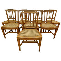 8 Italian 19th. c walnut canned seat dining chairs