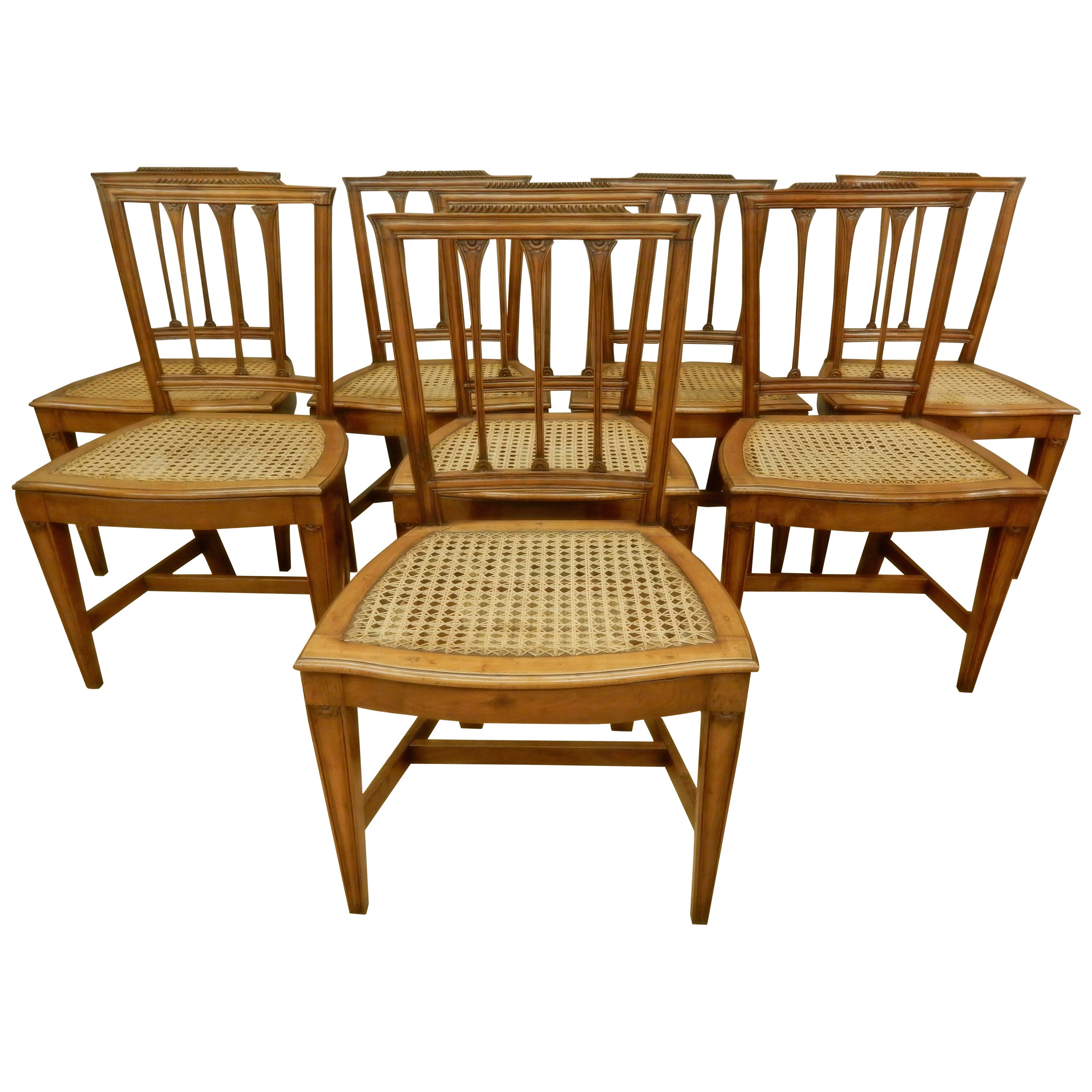 8 Italian 19th. c walnut canned seat dining chairs For Sale