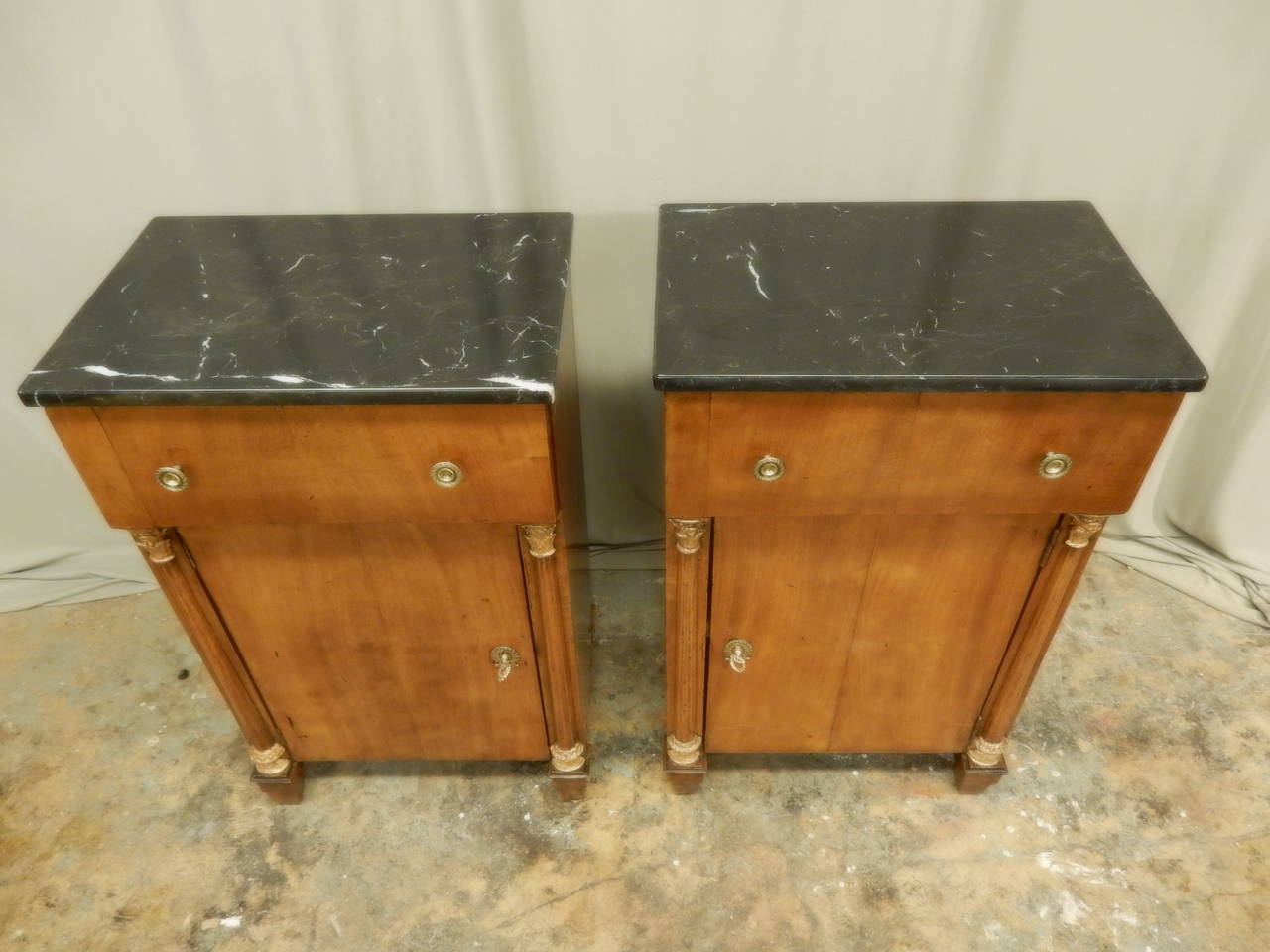 Pair of lovely warm patina Second Empire French bedside cabinets with one door, one draw and marble top.