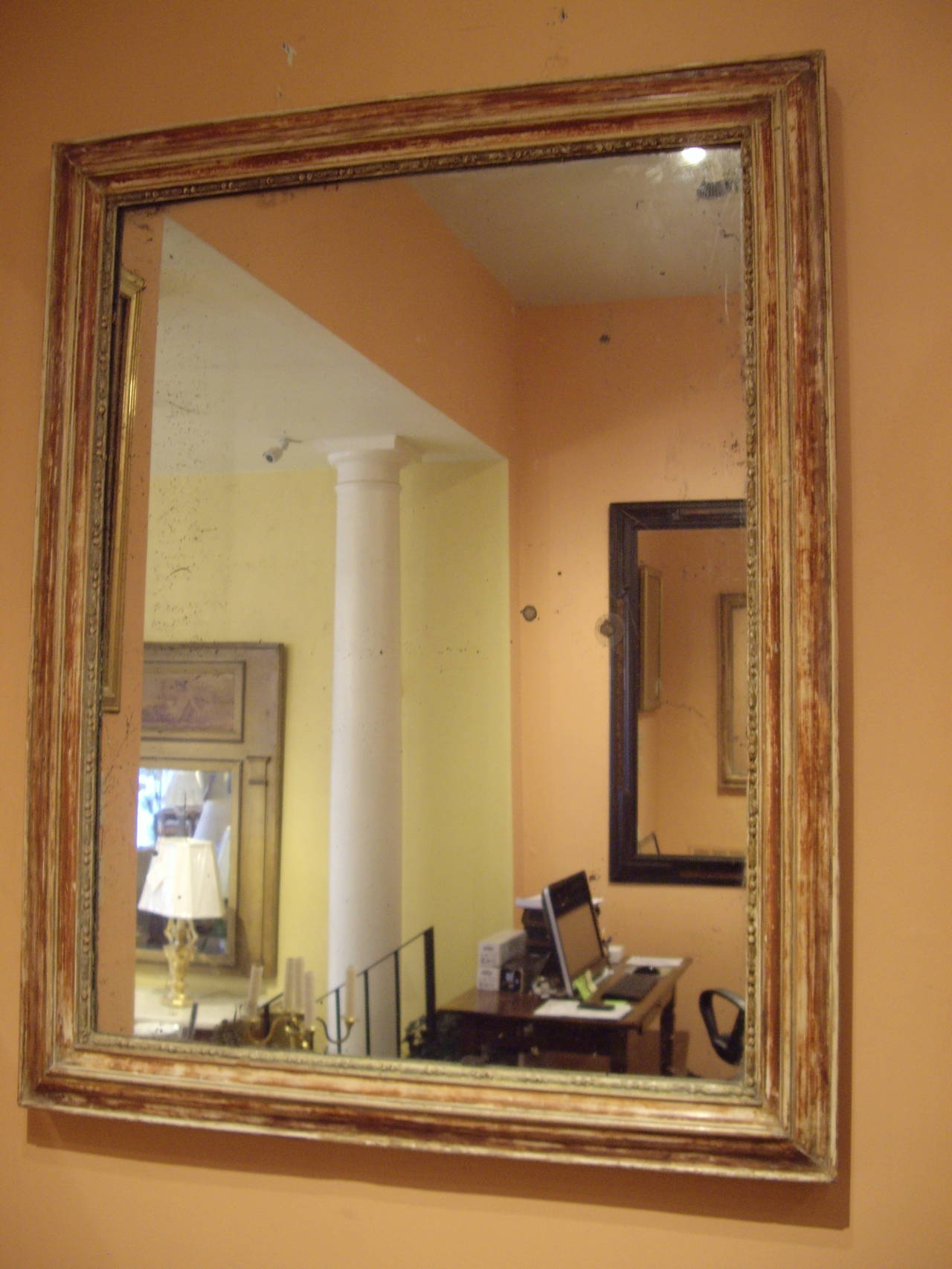 Lovely worn gilt 19th century French mirror. It has original glass.