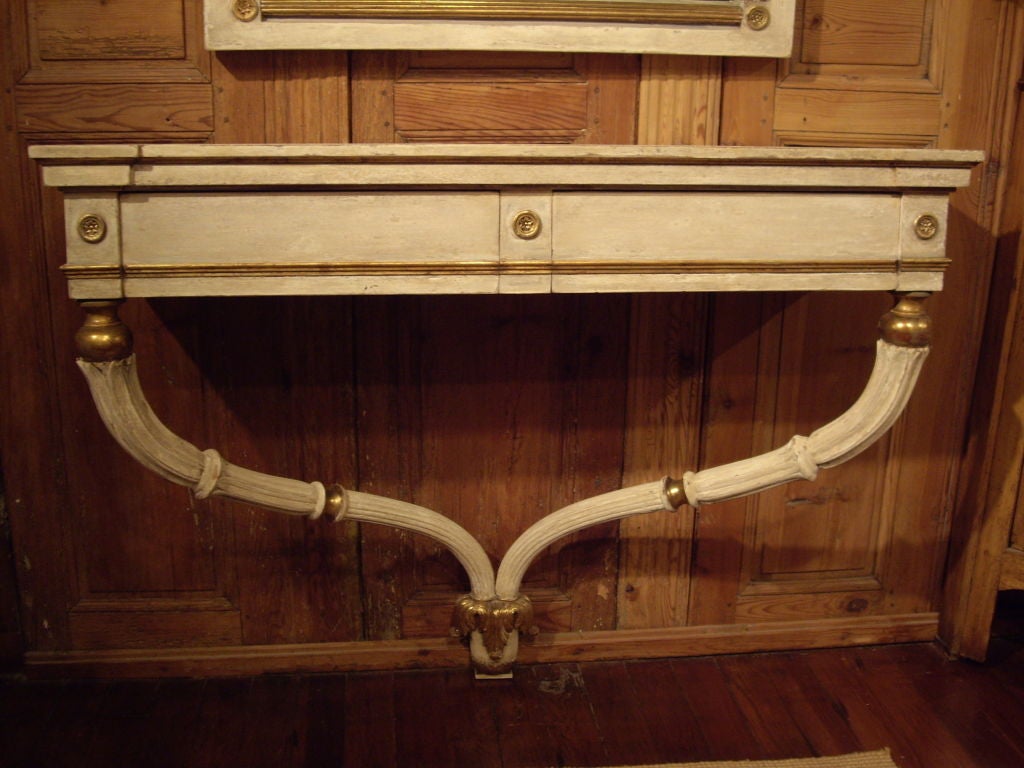 Painted and gilt mirror and console