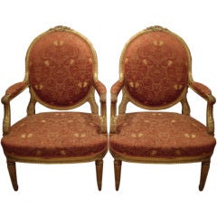 Large pair Louis XVI gilt arm chairs
