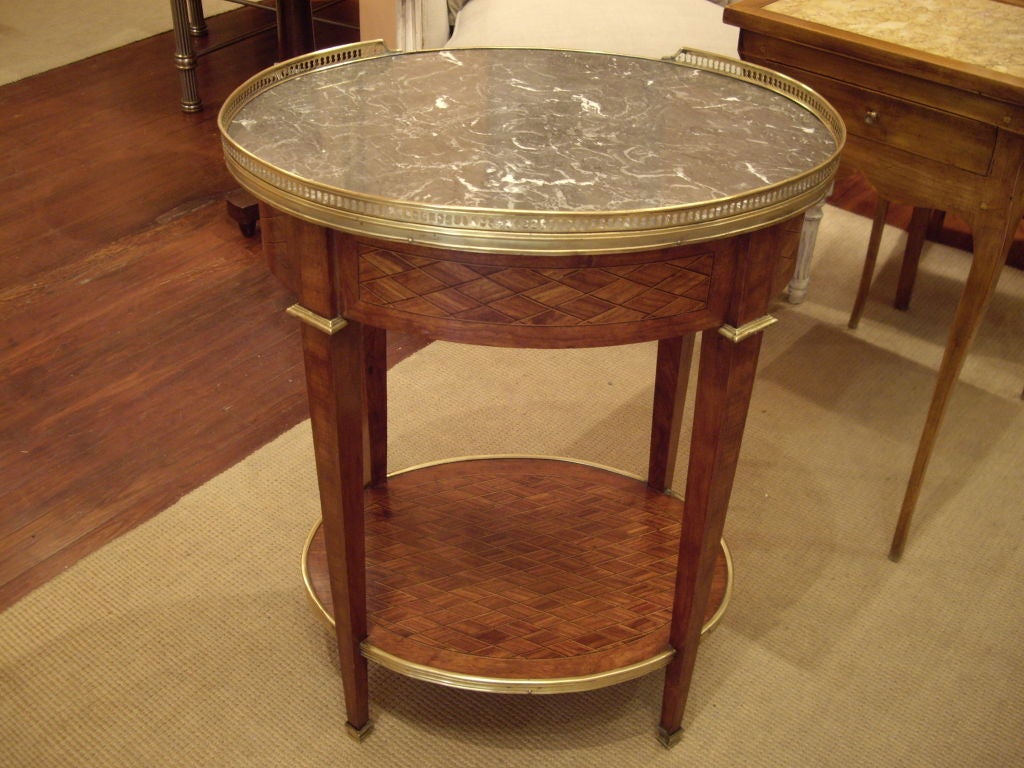 Marble Oval inlaid Louis XVI side table