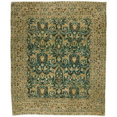 An Antique Persian Tabriz Rug