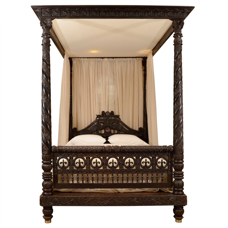 A Finely Carved Anglo-Indian Ebonized Mahogany Tester Bed
