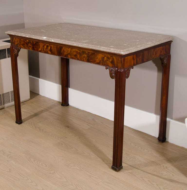 A Pair of George III Mahogany Console Tables with Grey Fossil Marble Tops