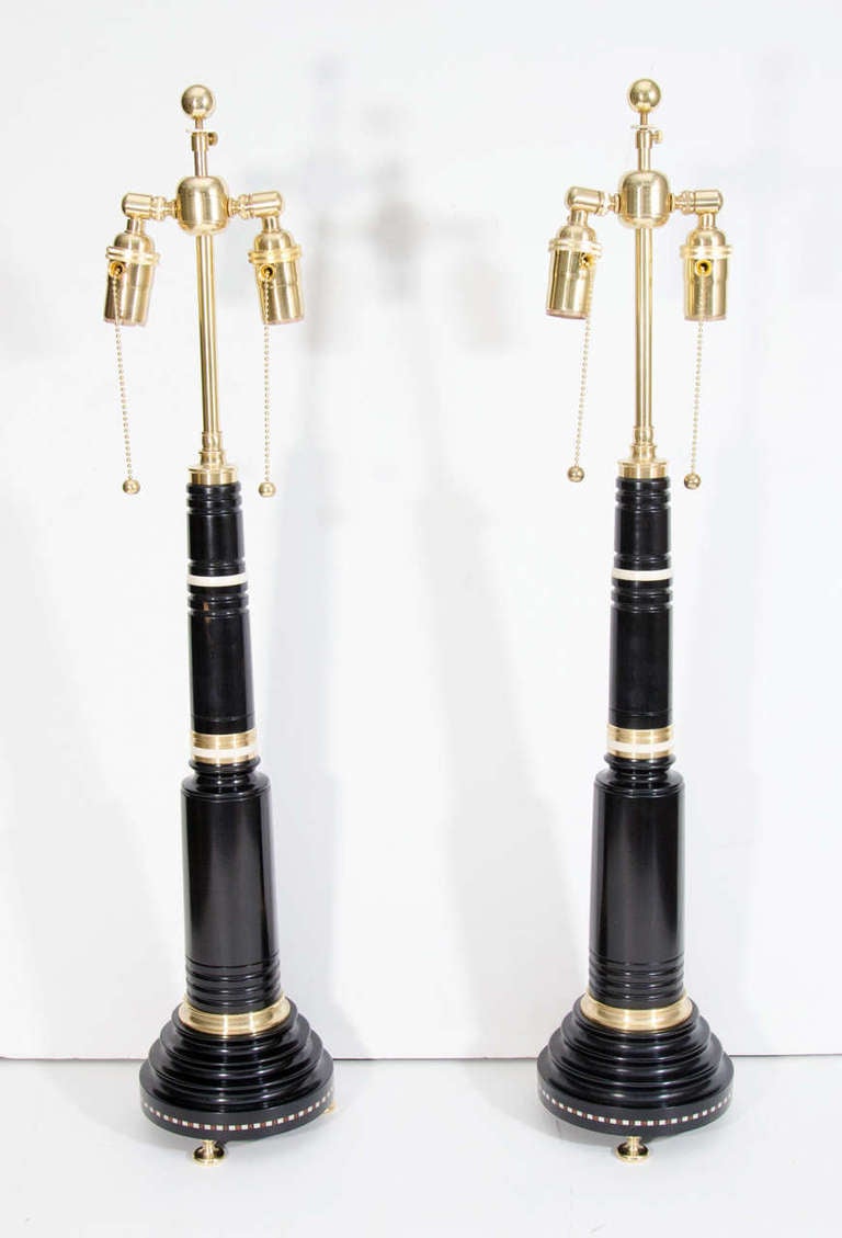 A Fine Pair of French Empire Style Ormolu Mounted Ebony Lamps