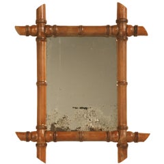Petite Antique Continental Mirror in Faux Bamboo Frame