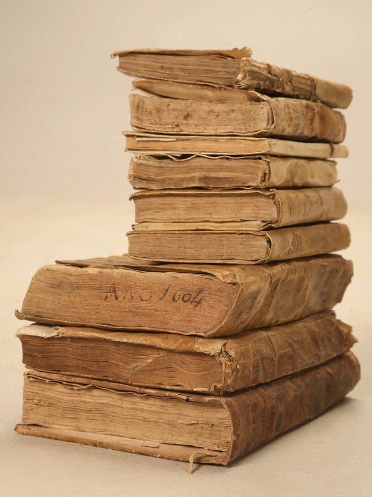 Set of 9 Latin and Spanish books retaining their original vellum bindings range in date from the 1604 to 1880.. 

** Measurements provided are for the largest book. The smallest book is 5.75