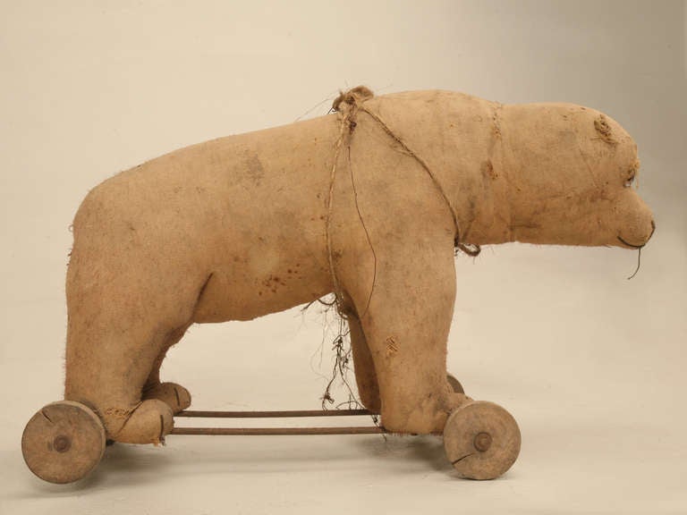 antique steiff bear on wheels