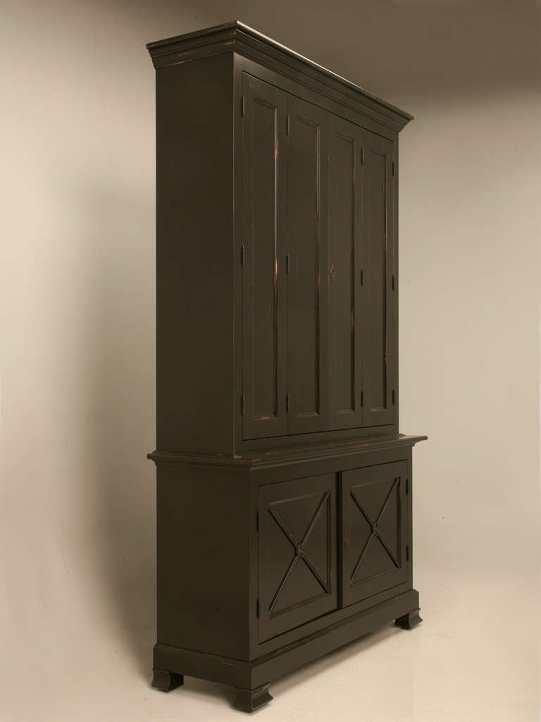 This handsome handmade custom cabinet with bi-fold doors is a replica of an original Directoire period (1793-1804) style. Custom-made in our Old Plank workshop in Chicago. This striking cupboard offers bi-fold doors up top concealing several