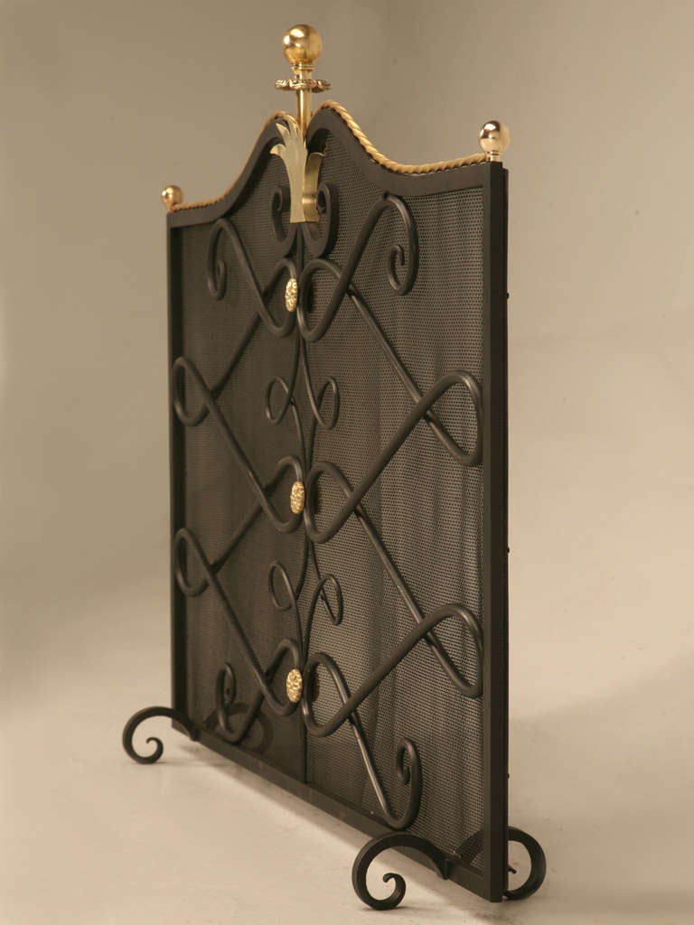 Mid-Century Modern Fireplace Screen in the style of Gilbert Poillerat made to order in any dimension. Highly decorative painted steel and brass Mid-Century Modern Fireplace Screen in the  made by the artisans in our own Old Plank Workshop in