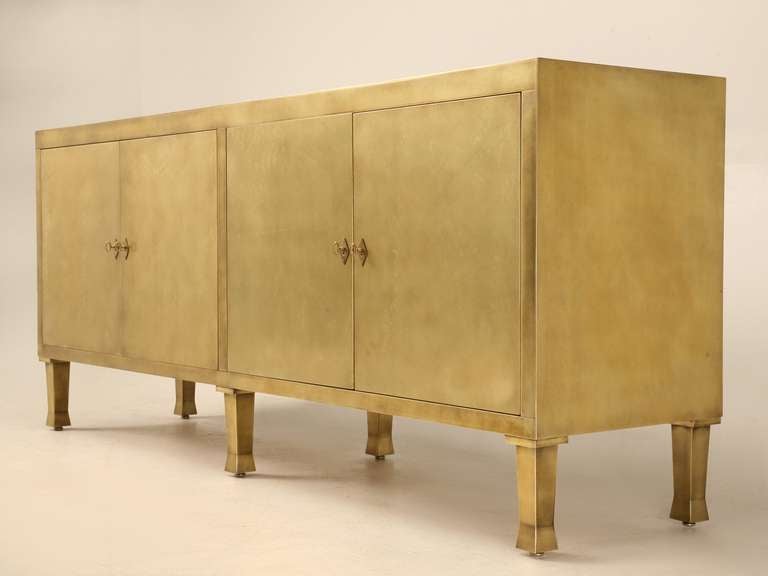 This spectacular Bronze or Available in Brass French Style Mid-Century Modern Buffet was custom made in our own Old Plank Workshop here in Chicago. It can be reproduced in any size, or of different materials including copper, brass, bronze or zinc.
