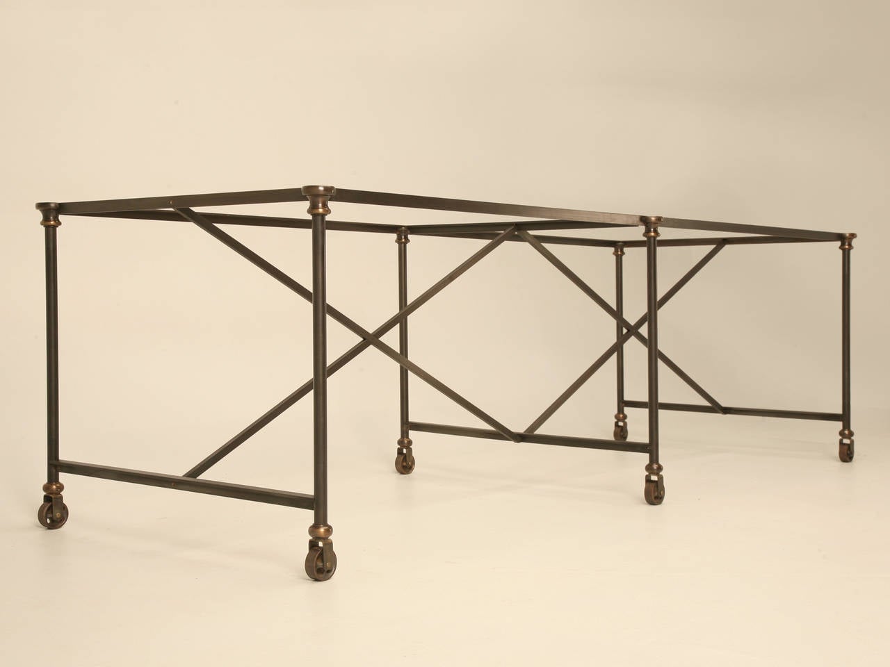 What you are looking at is the skeleton frame work for a French Industrial Style circa 1900 Made into a Modern Kitchen Island that we manufacture and offer in any size imaginable. Generally there is a stone slab, butcher block or just a beautiful