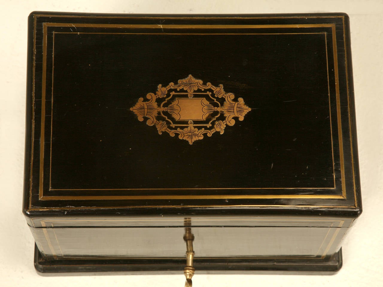 Antique French black lacquer and brass Humidor. Beautifully constructed with a mahogany interior and intricate brass inlays. The condition appears to be all original and would indicate it was well loved for the last 100 years. Hard to believe it