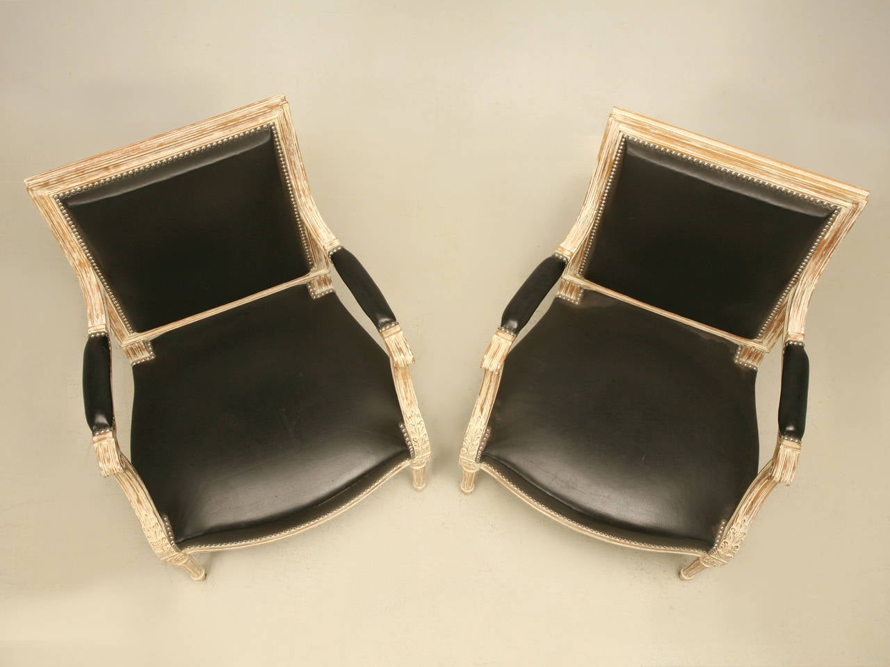French Louis XVI Style Painted Armchairs in Black Leather In Good Condition In Chicago, IL