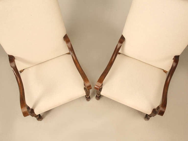 Circa 1800-1820 completely handcarved pair of original antique French white oak Louis XIII armchairs. Our Old Plank workshop have thoroughly rebuilt the chairs from the frame up, including proper horsehair padding and are now ready for your fabric.