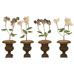 Antique Circa 1920 Set of Four Cast Iron Urns with Handmade Beaded Florals