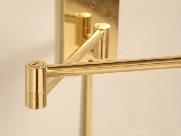 Late 20th Century Pair Solid Brass Swing Arm Sconces by Hansen New York