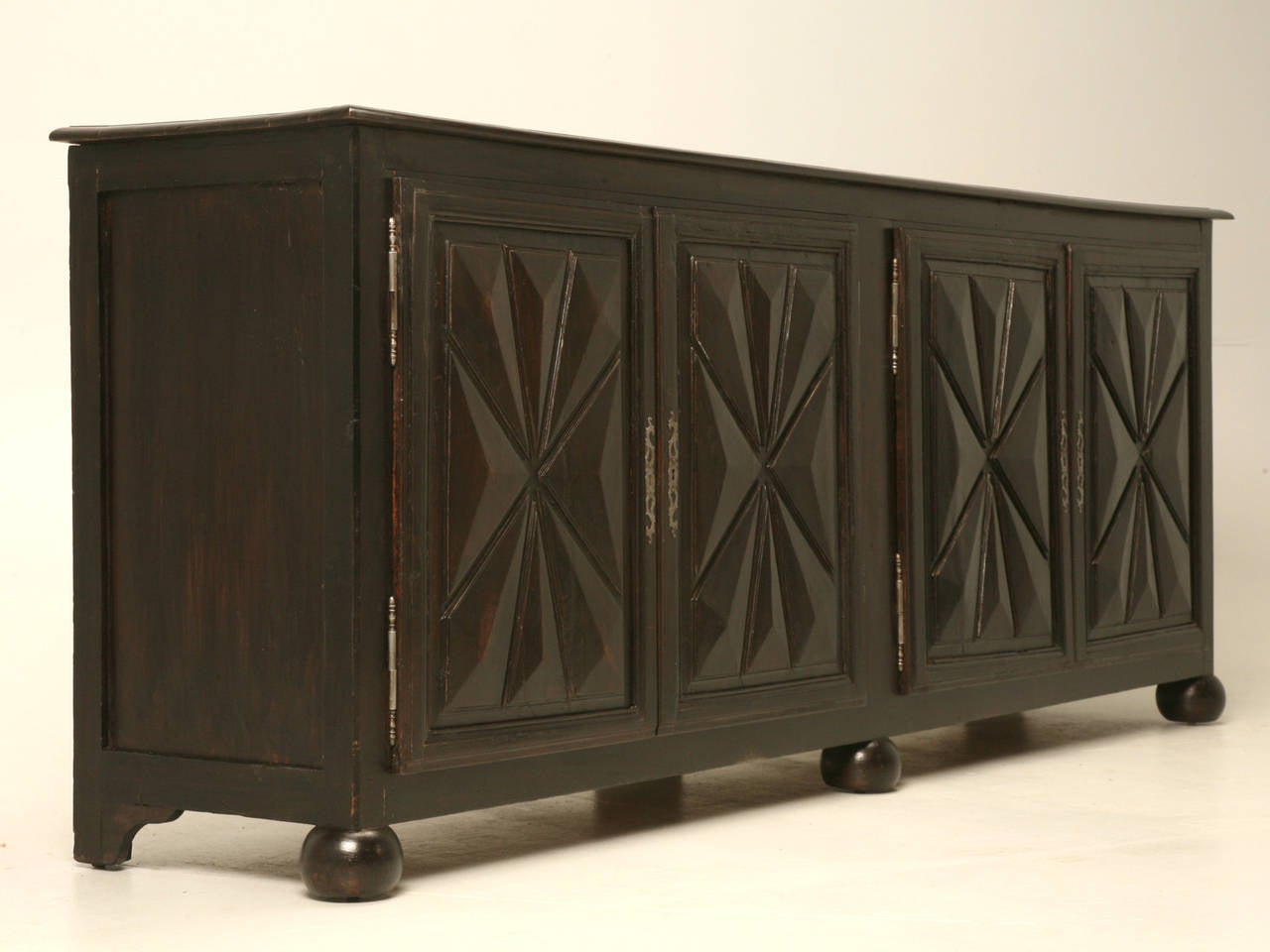 French antique Louis XIII style buffet, that our in house Old Plank workshop completely went through from the inside out, leaving nothing to chance. The aged and very dark finish on the exterior was only touched up as required for we did not want to