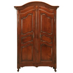 French Louis XV Style Armoire in Cherrywood, circa early 1800's Fully Restored