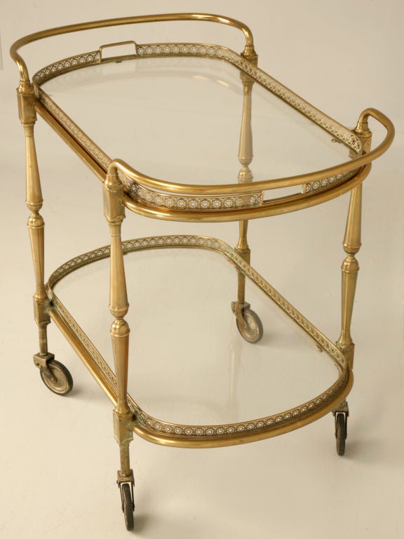 Do not confuse this exquisite vintage French serving cart with cheaper brass versions, this is a spectacular high quality cart. Constructed entirely of bronze and glass, this cart is suited for any room of the home, be it the dining room, living