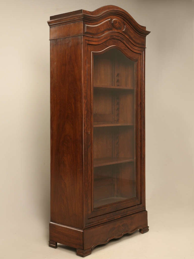 Outrageously opulent antique French crotch/flamed mahogany  glazed bibliotheque, whatnot case or china cabinet with awesome exotic burled wood, a hidden lower drawer, and bonnet top, too. This fine cabinet will definitely change a room with its