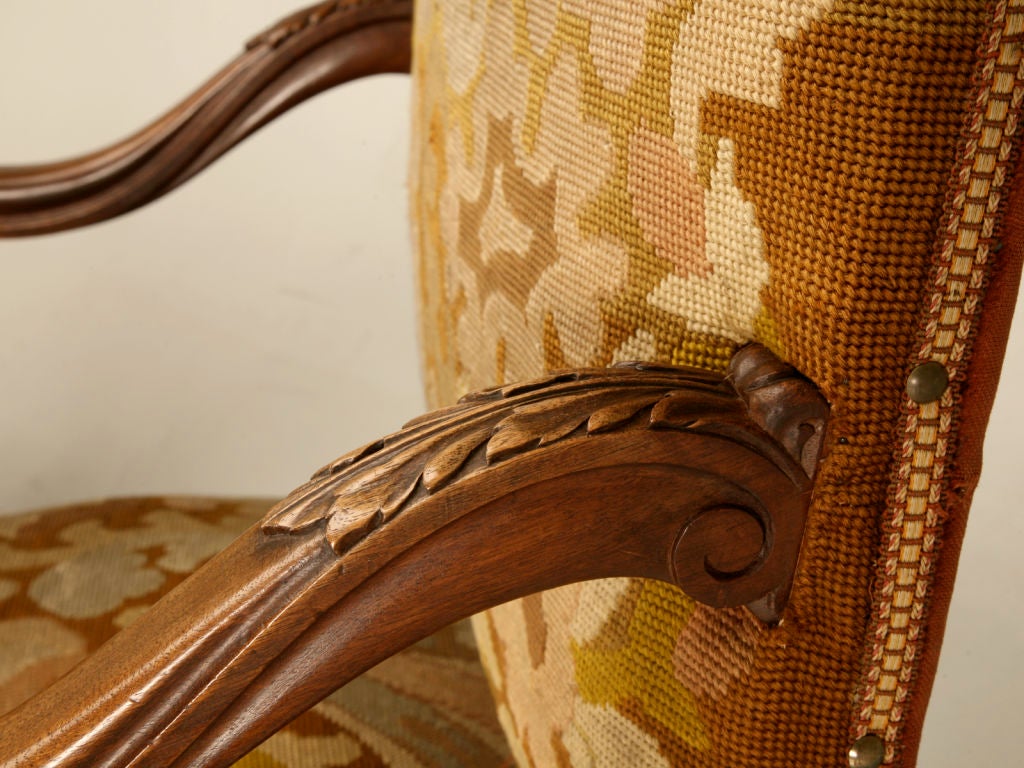 Pair of Heavily Carved Antique French Walnut Throne Chairs