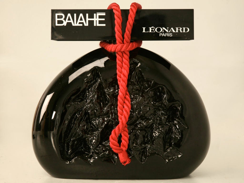 Priced each, these bottles are a fantastic find. Whether you are decorating a retail space or are an avid perfume collector, these are a must. Each bottle is highlighted in individual images.
 
Balahe (image 2) $SOLD  H: 11.25