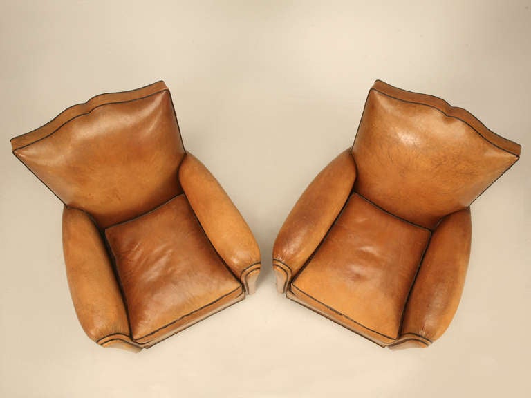 Mid-20th Century Pair of Conserved Original French 1940s Leather Moustache-Back Club Chairs
