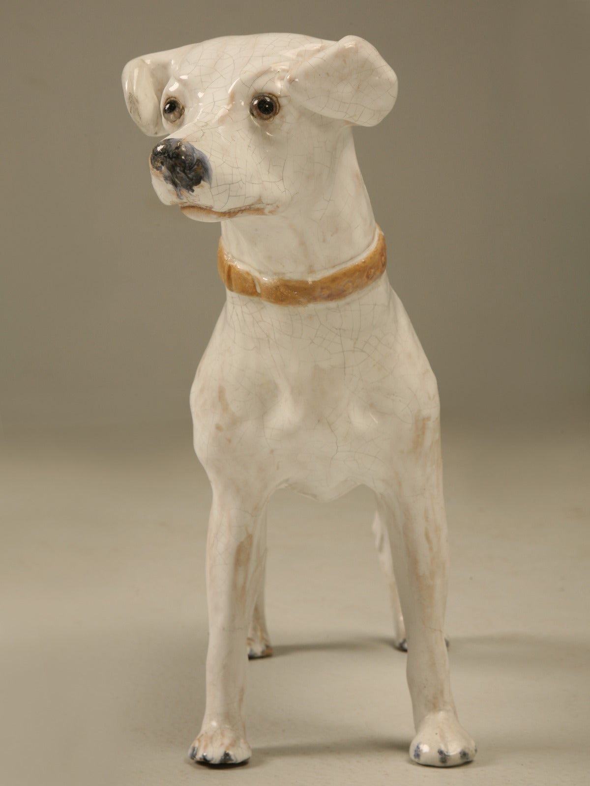 Jack Russell Terrier from the Calvados region of Normandy, France produced around 1900. The Calvados area was loaded with rich clay perfect of potters and this we believe may have been produced by the firm; La Poterie du Mesnil which has been around