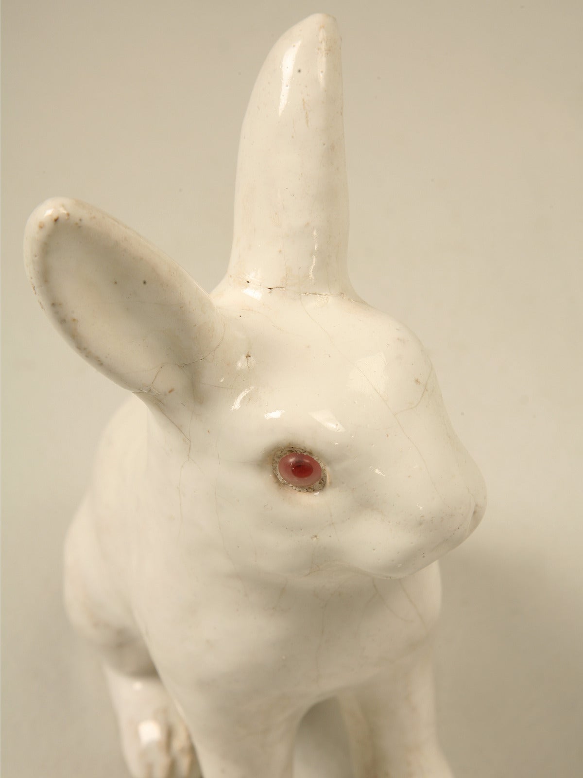 Almost certainly an earthenware rabbit produced by the company; La Poterie du Mesnil, from the Calvados region of Normandy, France, who have been in business since 1842. We highly suggest that if you are visiting the Normandy area, that you stop by