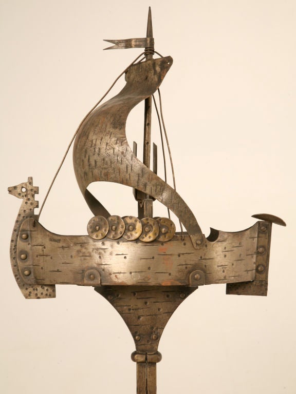 Ah-Ha! This original German viking ship formed smoker's stand would be awesome between two club chairs in a gentleman's club room, office, or library. Imagine the room in the 1920's dark leather furniture, rich mahogany panelled walls and fabulous