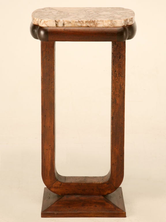 Unbelievable petite original French Art Deco marble topped table finished all the way around with a unique 