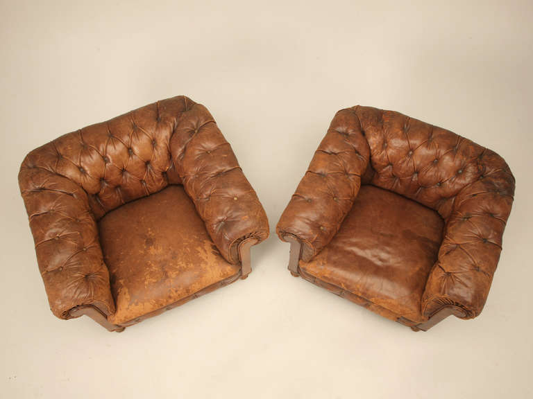 Circa 1880-1910 “Classic Pair of Chesterfield” Chairs. We found these wonderful, all original leather chairs in the south of France recently and carefully completed a structural restoration, including re-tying the springs, adding some more