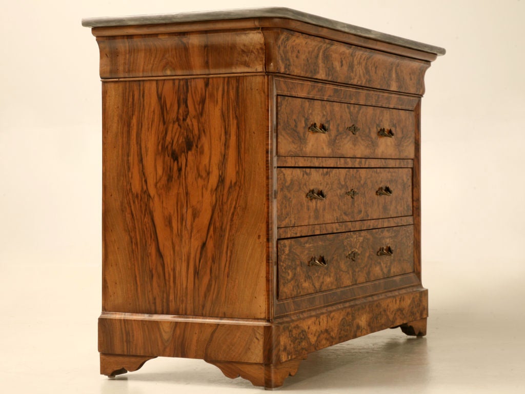 One of the best original Louis Philippe commodes we have ever seen, this antique French chest offers it all. Four large full width drawers provide abundant storage, it's original marble top makes a more durable surface to easily wipe up spills,