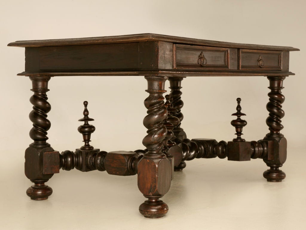Extraordinary antique French 2 drawer Medieval style writing table offers quality solid oak craftsmanship paired with modern functionality. Spanish, Italian, or Mediterranean architecture would be an awesome backdrop of course minimalist works, too.