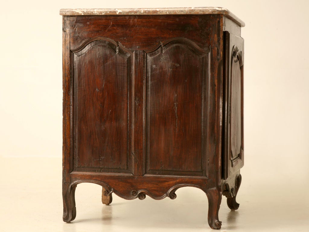 Antique French Small Cupboard made from beautiful French Walnut with a magnificent Marble Stone Top. With a ton of character and charm, we are proud to offer this extra deep 18th century Solid French Walnut Louis XV Cupboard retaining its original
