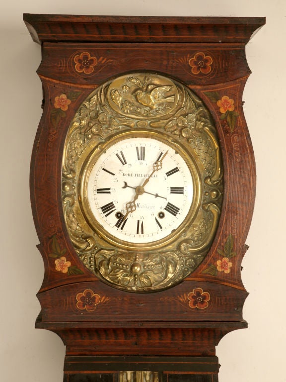 Outstanding original antique French, hand-painted tall case clock with faux grained wood, and a stylish, detailed hand-painted floral trim. A stunning, highly decorative, original movement finishes this great clock! This is truly an incredible find,