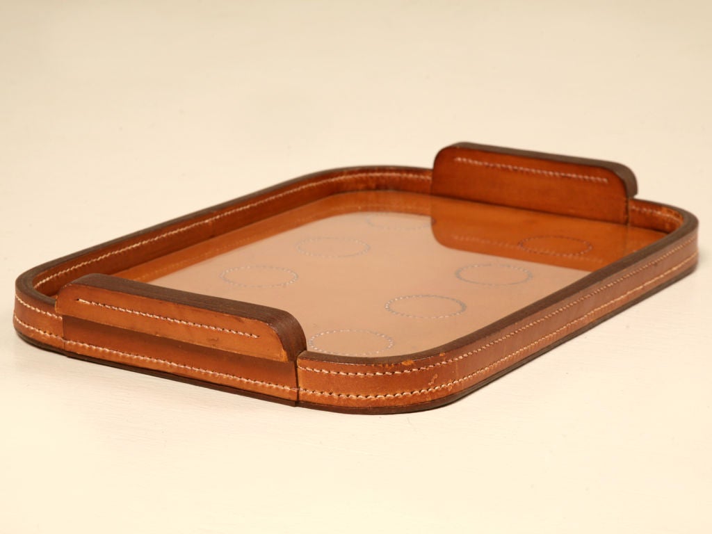 Outstanding signed vintage French “Hermes” soft and supple stitched leather tray. This fine tray offers not only stunning good looks but, offers a plethora of utilization options. A timeless design gives this tray the opportunity to be used in a