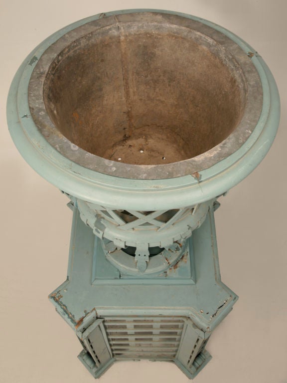Rumor has it that this finely constructed solid-wood lattice work urn and pedestal were on on display at the Palace of Versailles. Of course, we have no way to authenticate something that happened well over 100 years ago. We do know however, that