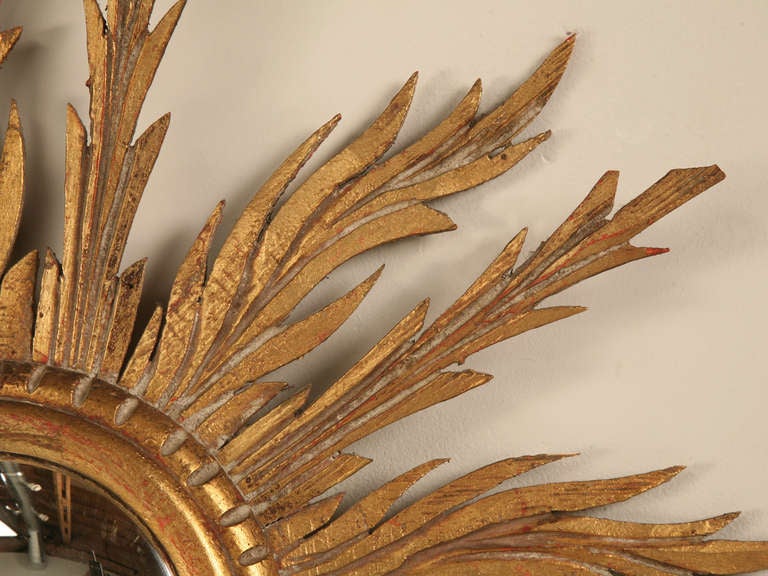 Mid-20th Century Incredible Vintage Italian Gilt Sunburst Convex Mirror w/Ornately Carved Rays