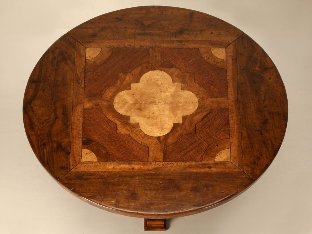 This is a copy of an 18th century French Round Dining Table, that one might have seen in Southwest France, or the Catalonia region of Spain. Our country French Round Dining Table is handcrafted in our Old Plank workshop, from reclaimed solid walnut,