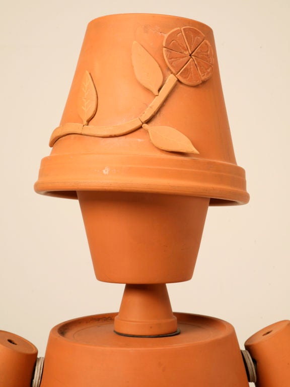 terracotta flower pot man garden ornament